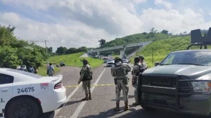abandonan_restos_humanos_en_bolsas_negras_en_la_carretera_poza_rica-cazones.jpeg_193648225